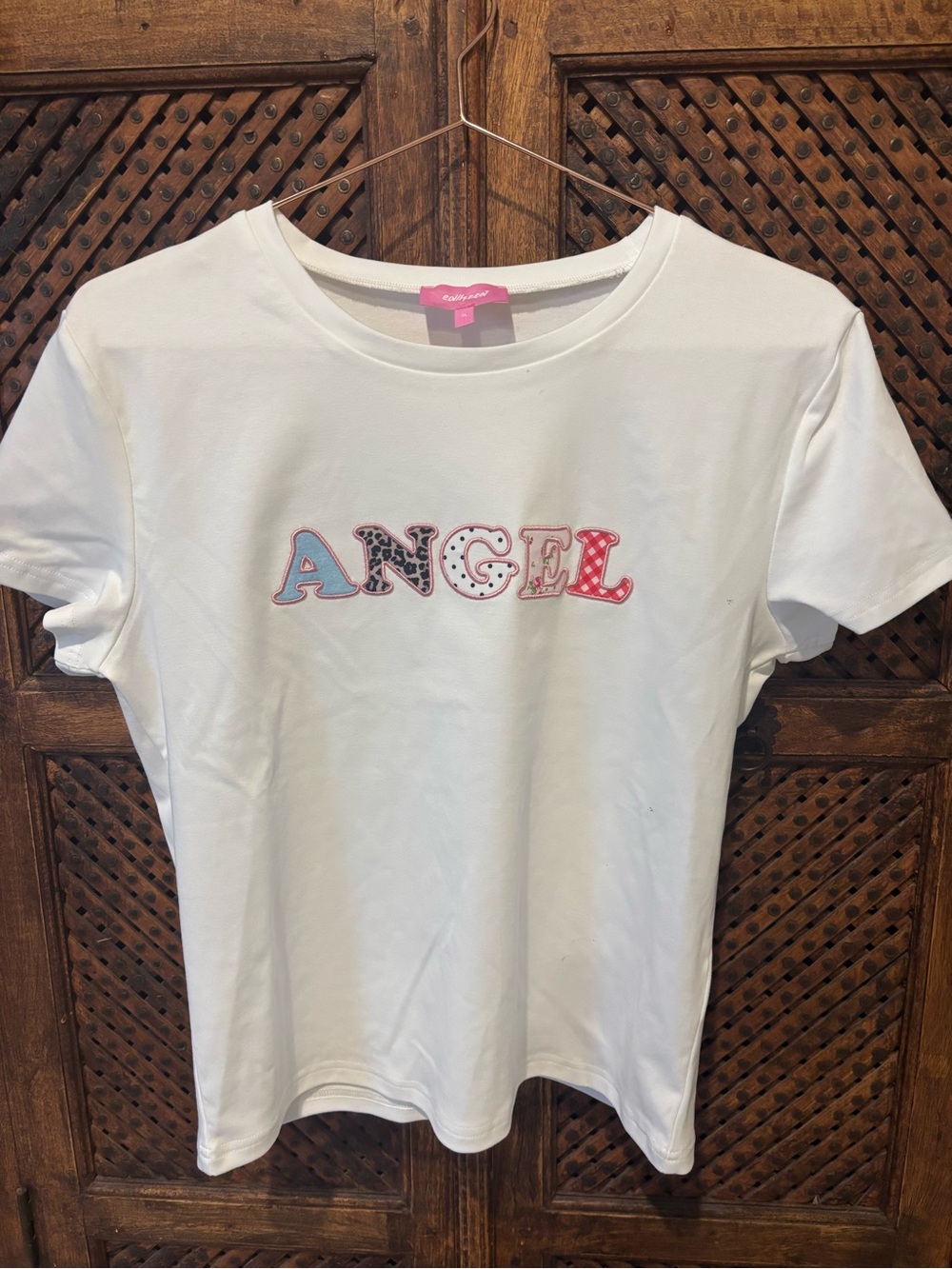 Edikted White 'ANGEL' Graphic Tee with Multicolor Letters